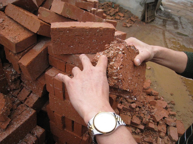 The problem is the little white things; too much calcium oxidizes before the heating process, leading to this brick powder